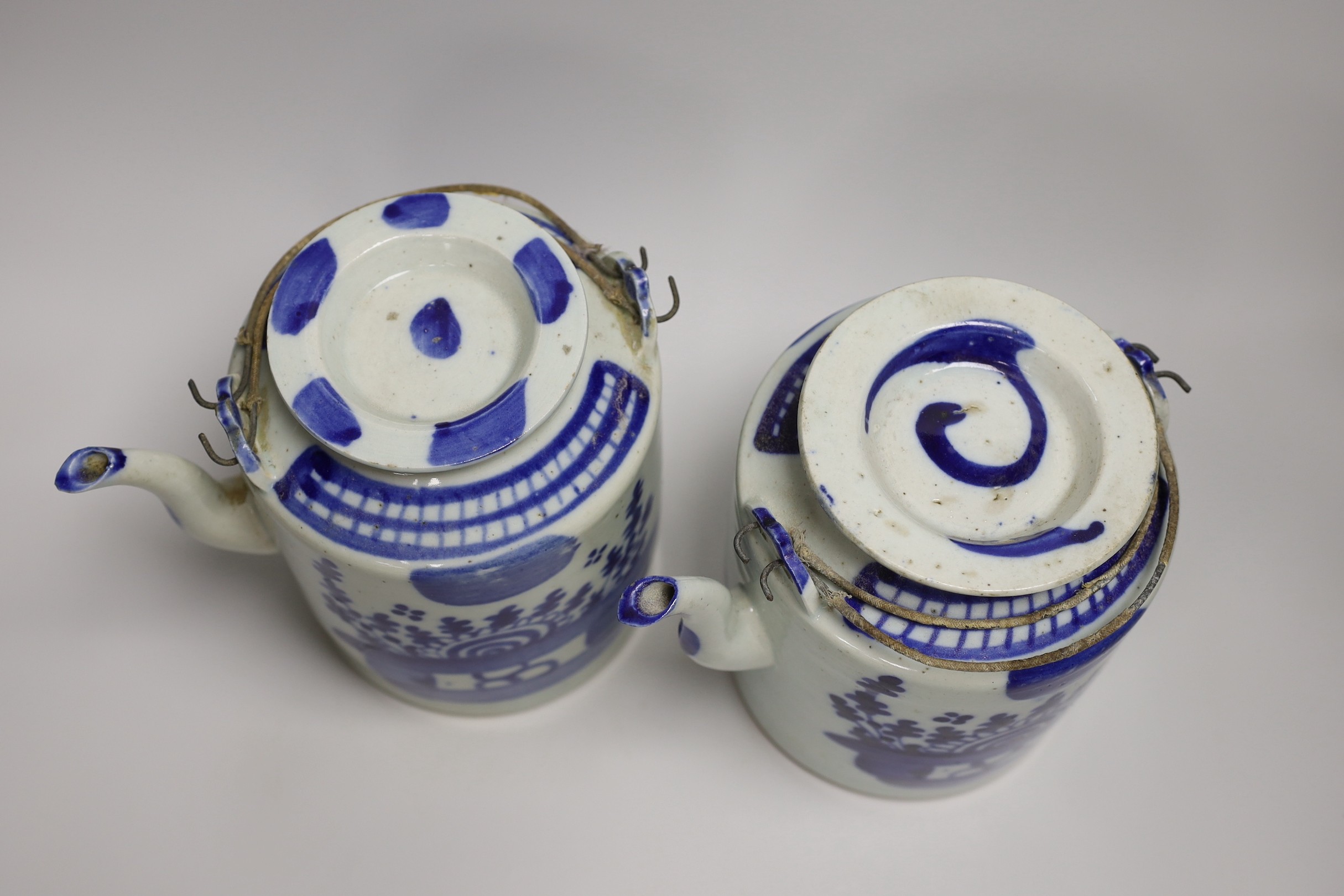 Two large Chinese blue and white teapots and covers, early 20th century, 19.5cm tall